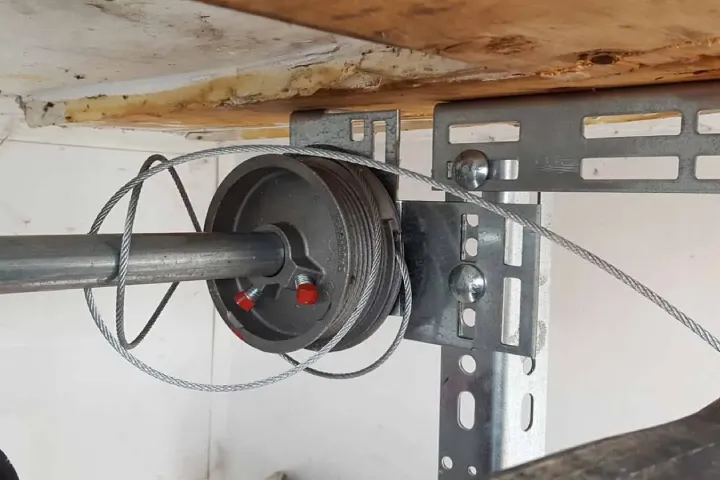 Garage door cable repair service for snapped loose or frayed lift cables