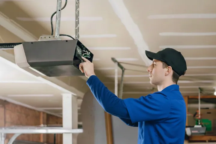 Garage door opener repair service for motor remote and sensor issues