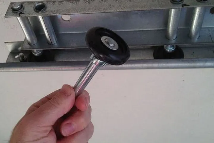 Garage door roller replacement for quieter smoother and safer movement